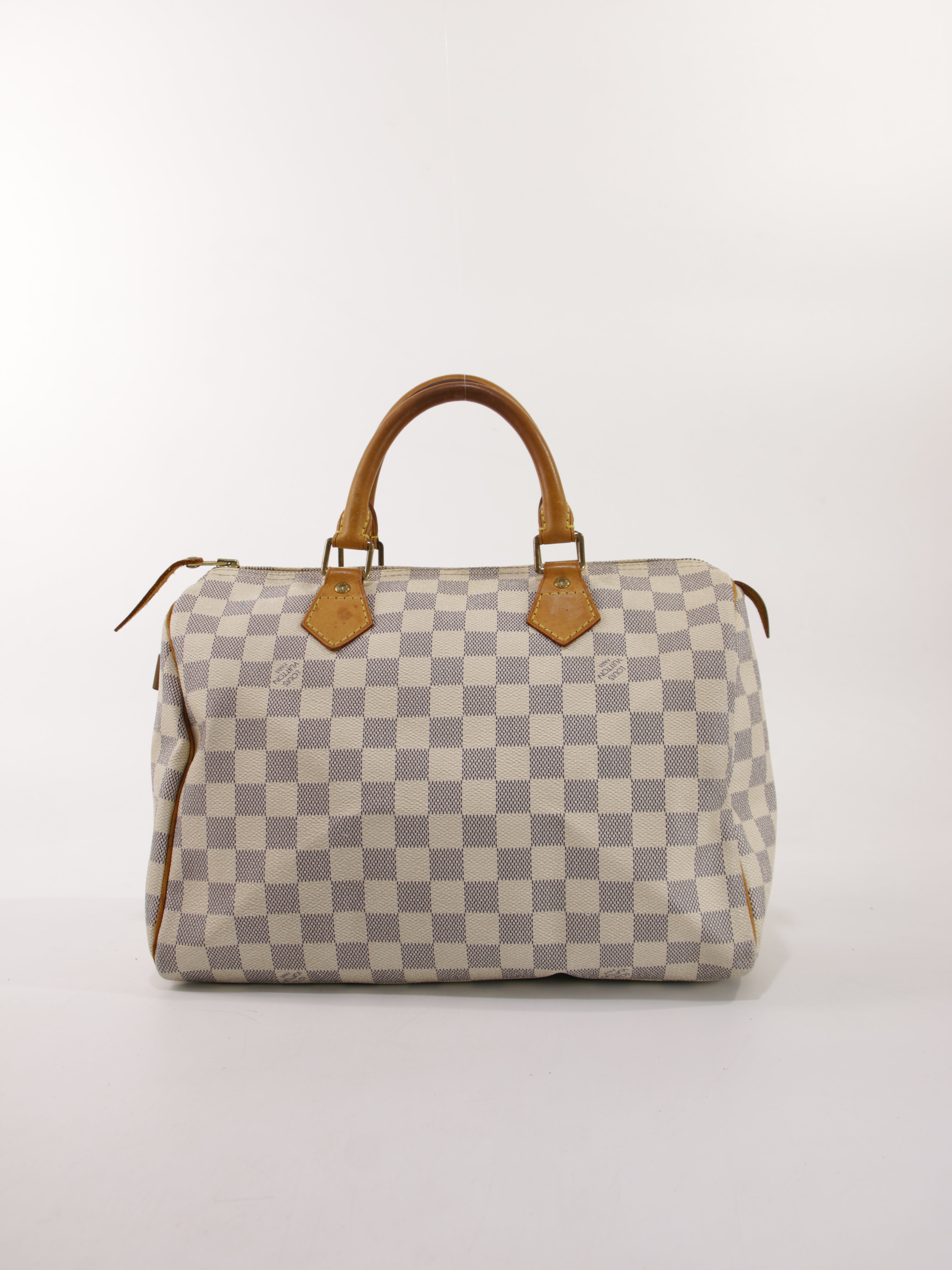 LOUIS VUITTON KÄSILAUKKUJA